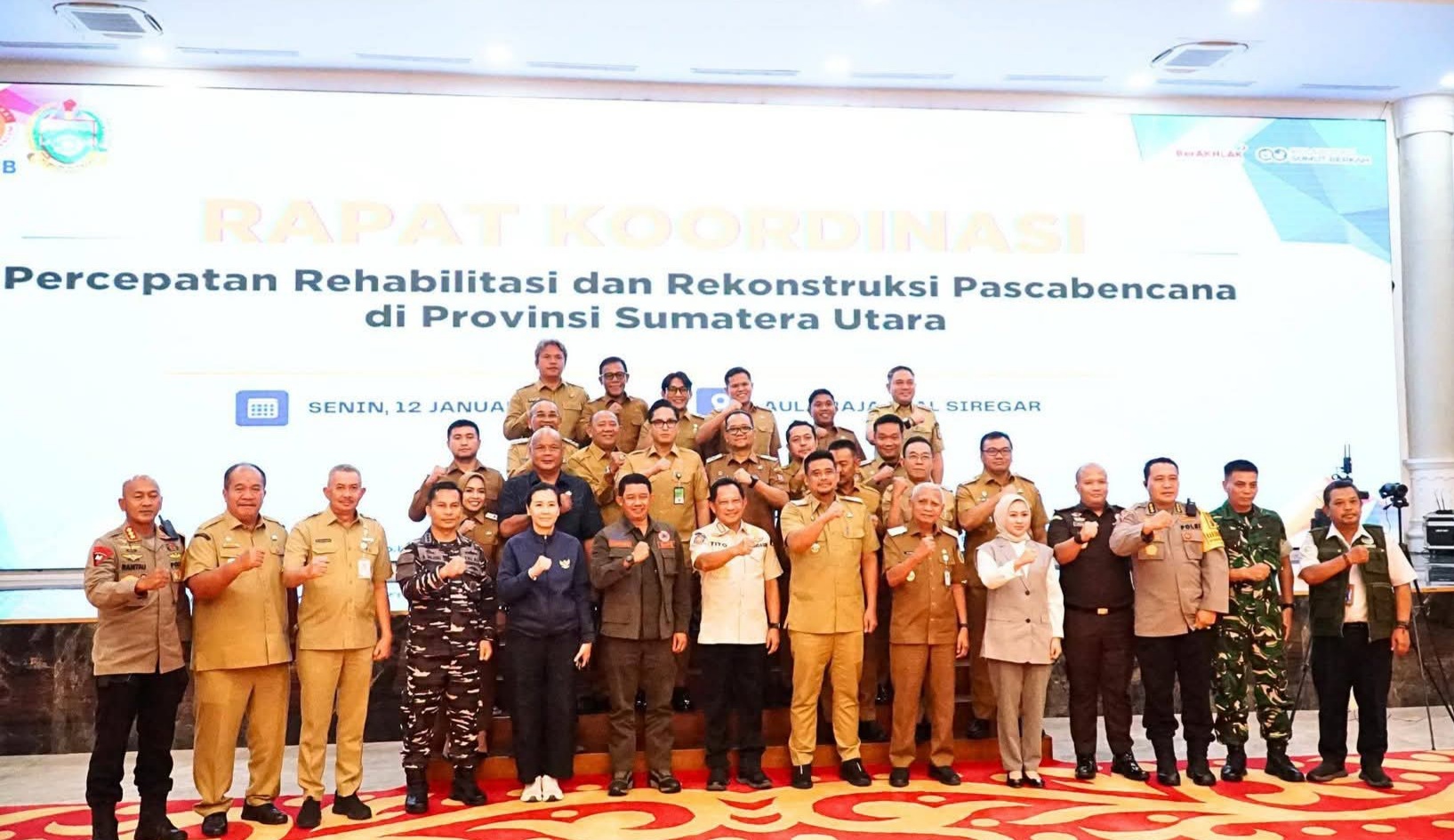 Bupati Labuhanbatu mengikuti Rakor Percepatan Rehabilitasi dan Rekonstruksi Pascabencana di Provinsi Sumatera Utara di Medan jalam di ponegoro